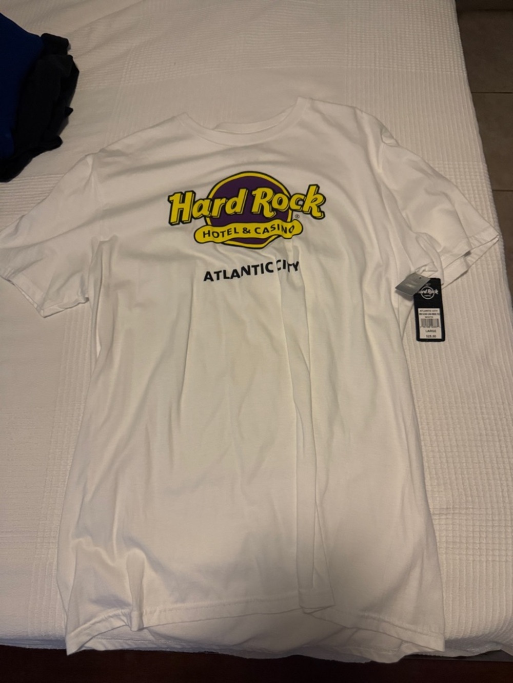 Hard Rock Cafe White T-Shirt with Yellow & Purple Logo